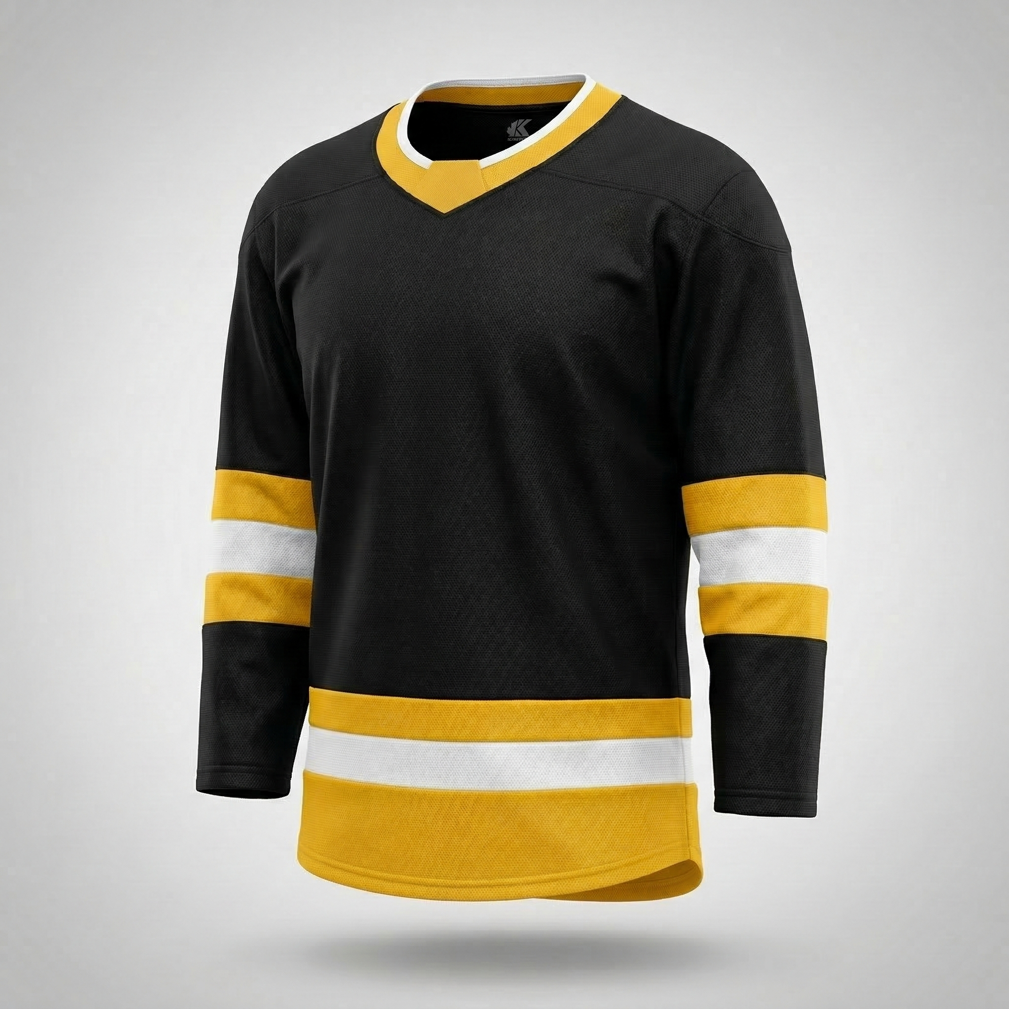 Kobe Sportswear K3GL Black hockey jersey with yellow and white accents on a gray background