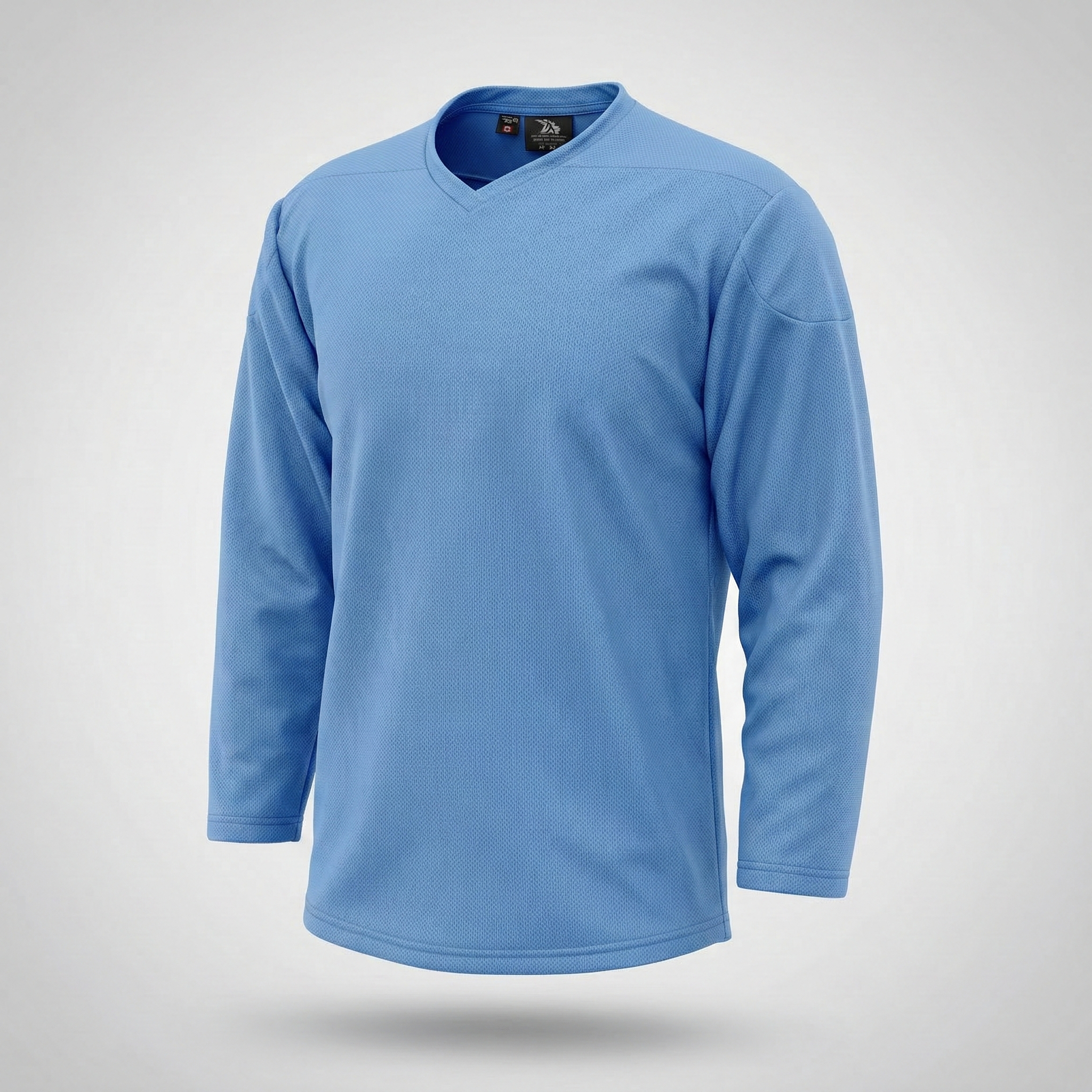 Kobe Sportswear Shirt Blue long-sleeve shirt on a light gray background